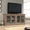 Spacious Salt Oak TV Stand,Tempered Glass Doors, Accommodates TVs Up To 80-Inch